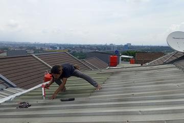 perbaikan atap bocor