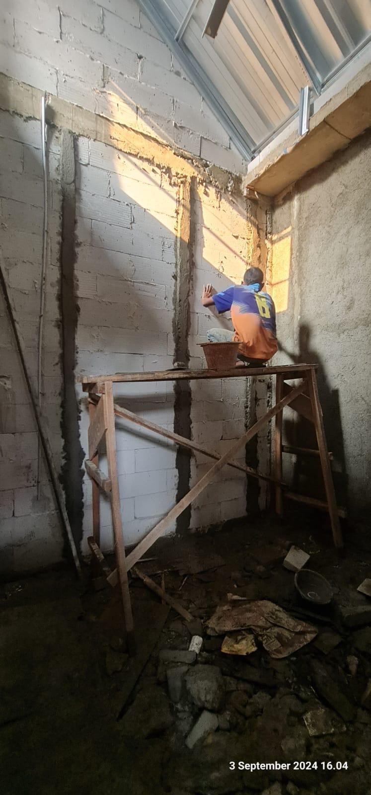 Pengecoran dinding rumah