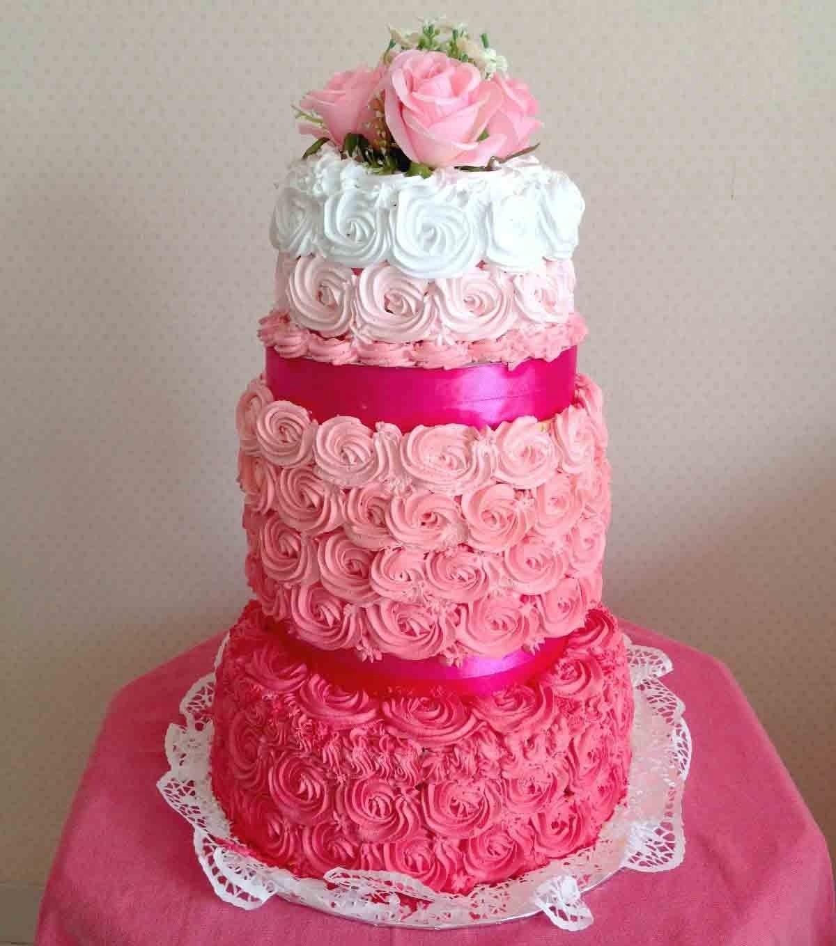 Kue ulang tahun pink ombre tiga tumpuk