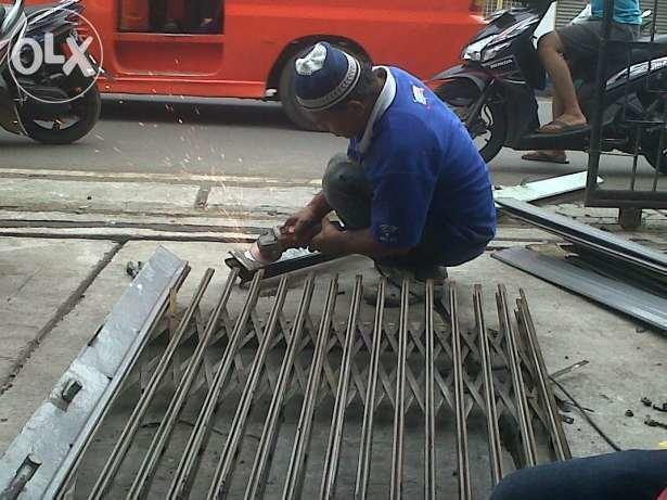 183750476 1 644x461 jasa servis folding gate bandung dan pintu rollingdoor bandung kota rev002