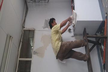 Perbaikan dinding retak dan Pengecetan